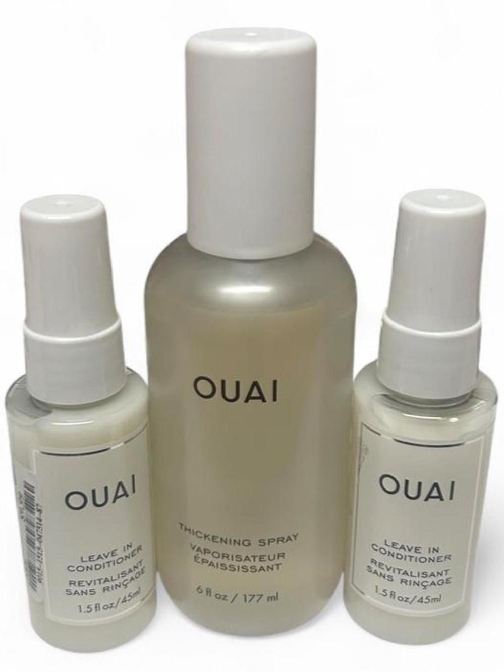 New OUAI Thickening Spray (6oz) & 2 Leave-In Conditioners (1.5oz each).